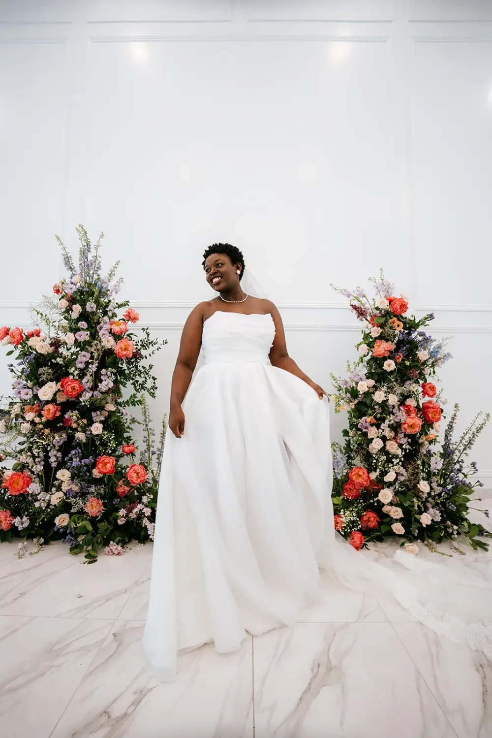 Model wearing a white bridal gown