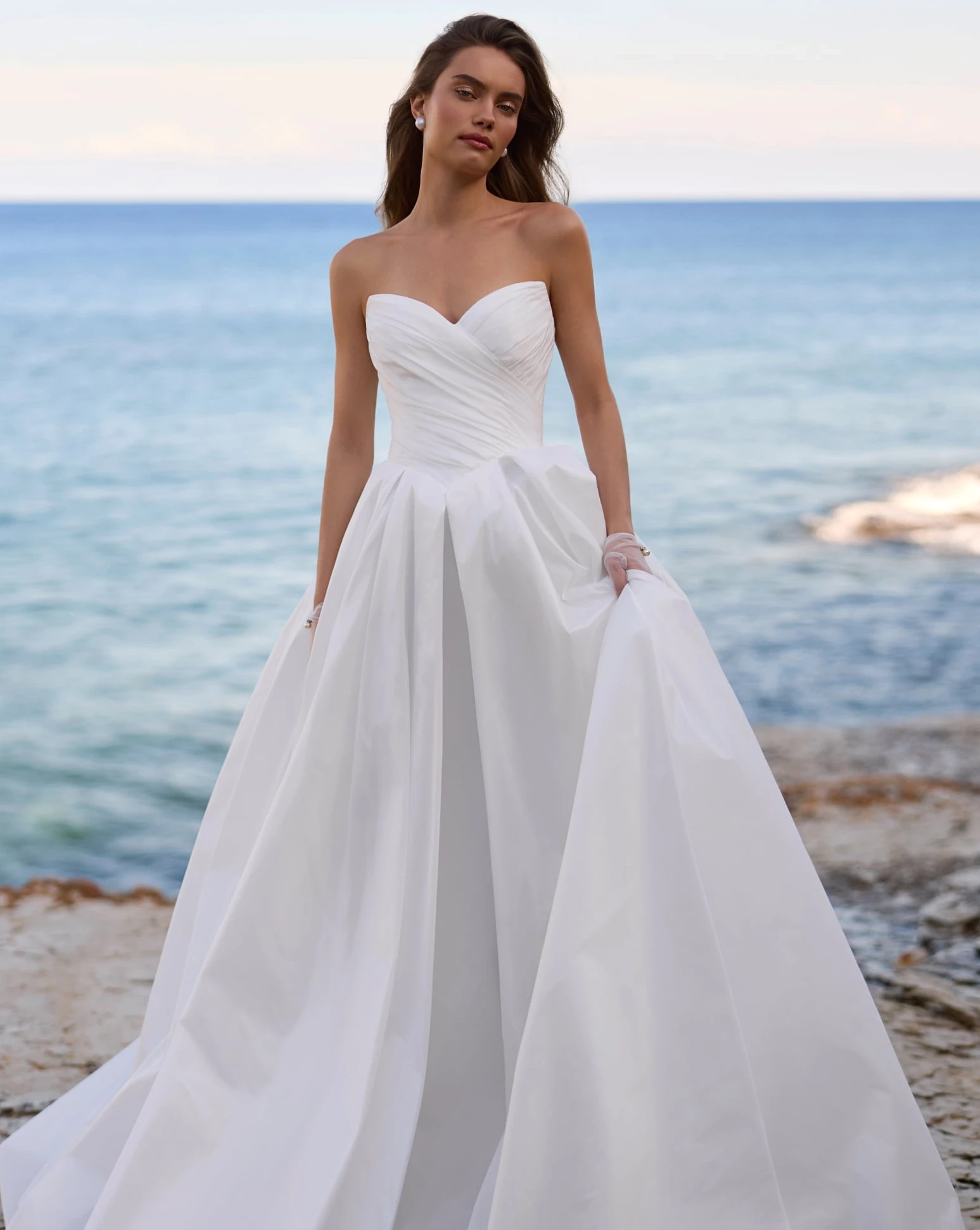 Model wearing a Dresses with Sleeves style gown