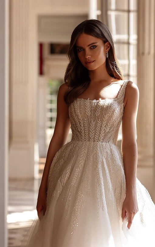 Model wearing a Beading style gown